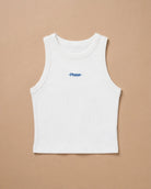 White Biweekly tank top with blue ‘Phase’ text that is crossed out, laying flat against a beige background