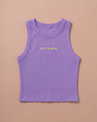Lilac Biweekly tank top with yellow ‘BOTH & MORE’ text laying flat on beige background